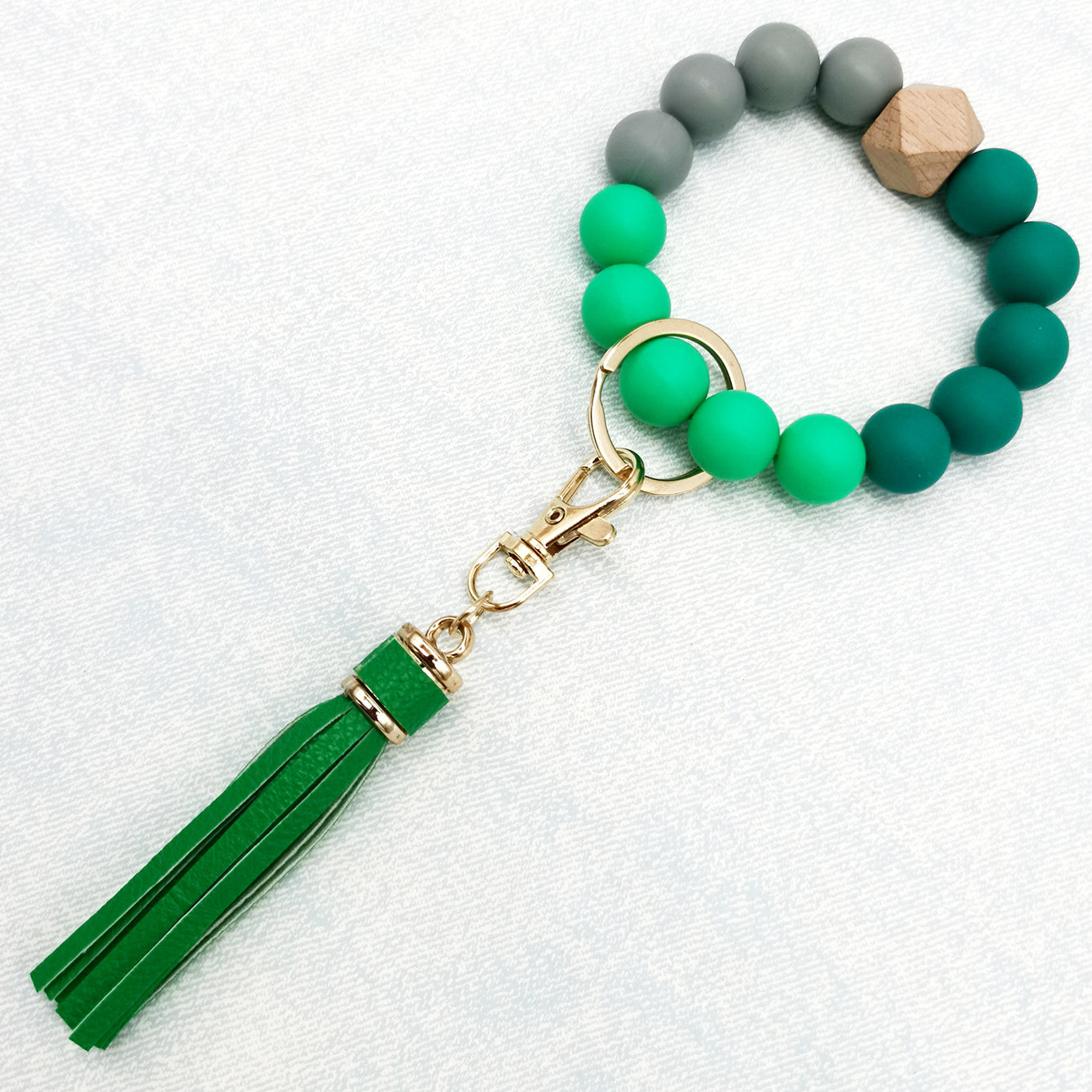 Pulsera de cuentas de silicona con borlas al por mayor llavero de muñeca